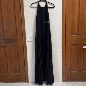 A.L.C pleated maxi dress with green lace cutout.